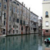 Buildings rising from the water