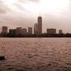 A lonely rower on the Charles River, panorama towards Boston