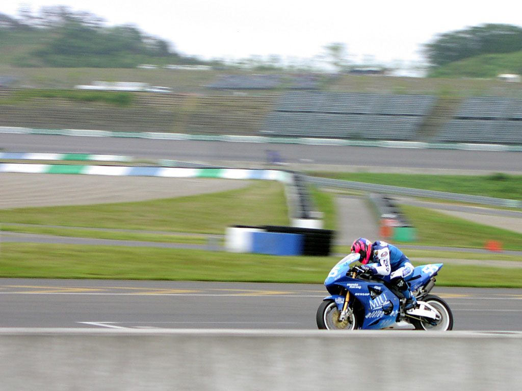 Road Race - A racer prepares to accelerate down the front stretch