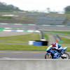 Road Race - A racer prepares to accelerate down the front stretch