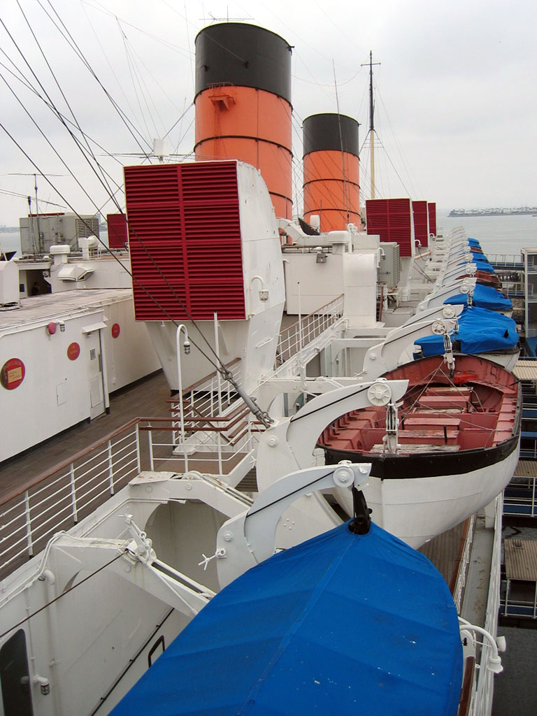 RMS Queen Mary - View of lifeboats and smokestacks from one of the top decks