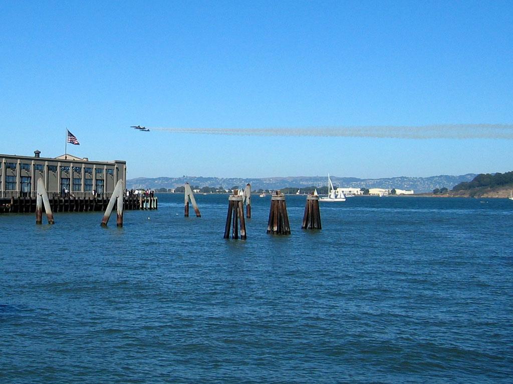 The Blue Angels - Four F/A-18 Hornets in the Diamond position near the Emarcadero Ferry Building