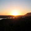 Rodeo Beach - Sun approaching the water behind the footbridge acroos Rodeo Lagoon