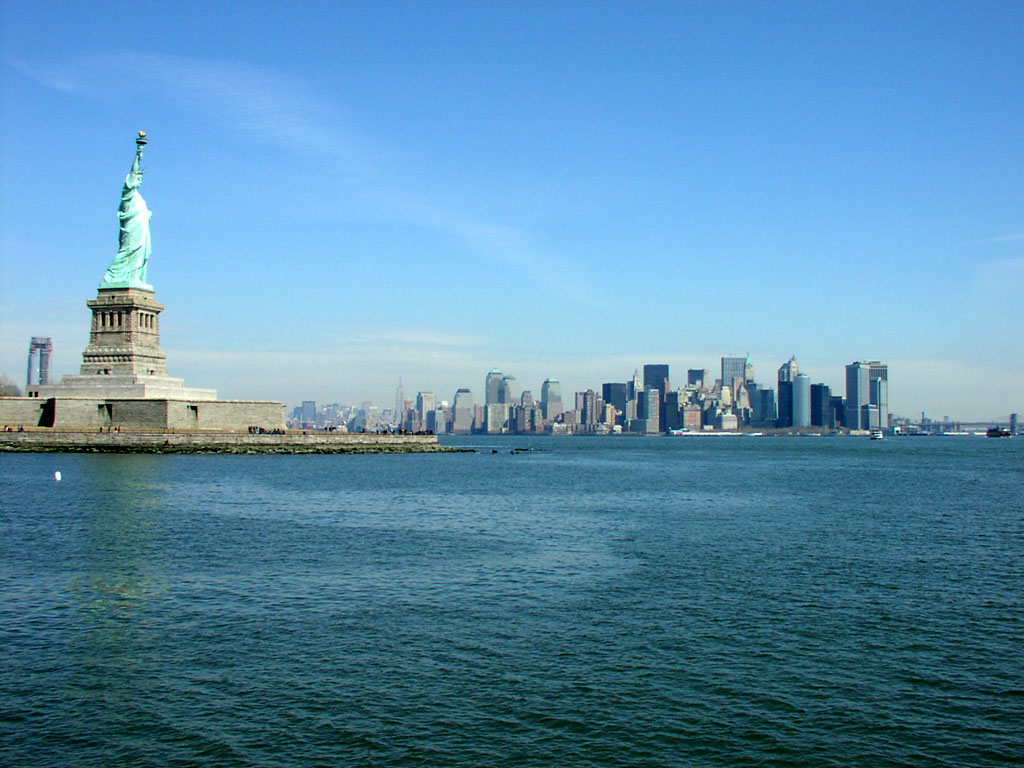 Liberty Island and the Statue of Liberty overlook Manhattan