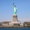 Closeup of Liberty island, with head-on shot of Statue of Liberty