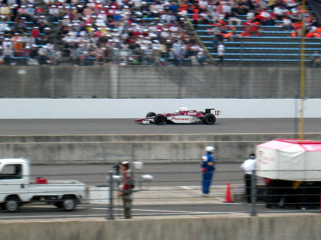 Indy 300 - The #12 zips past the grandstands