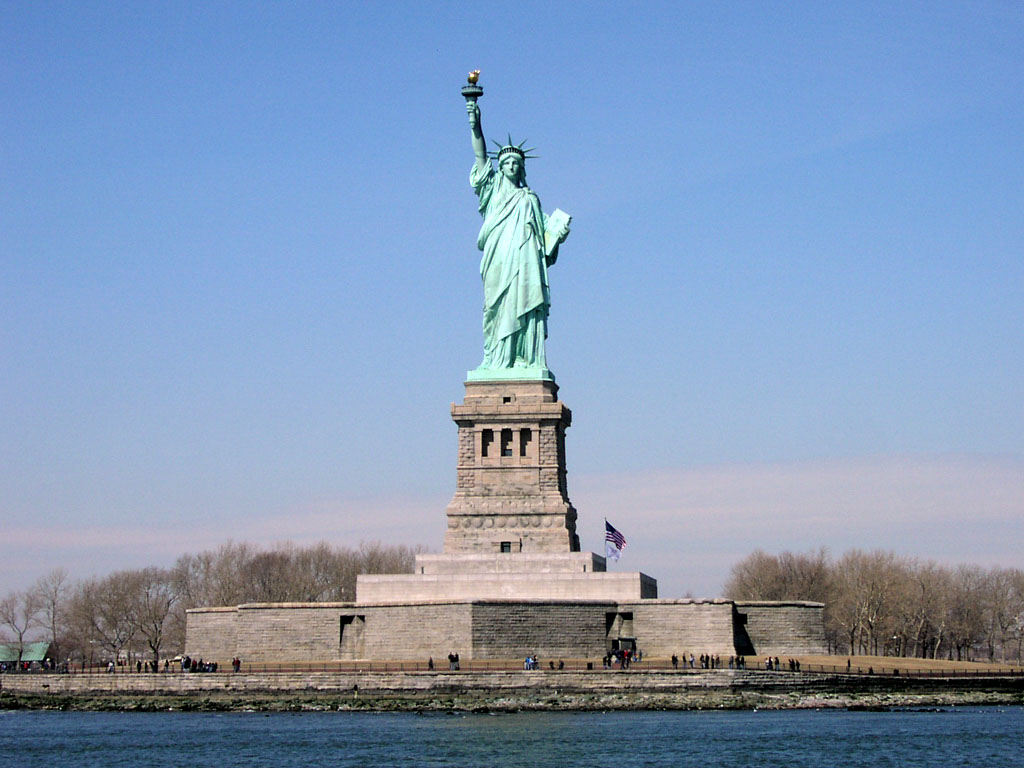 Closeup of Liberty island, with head-on shot of Statue of Liberty